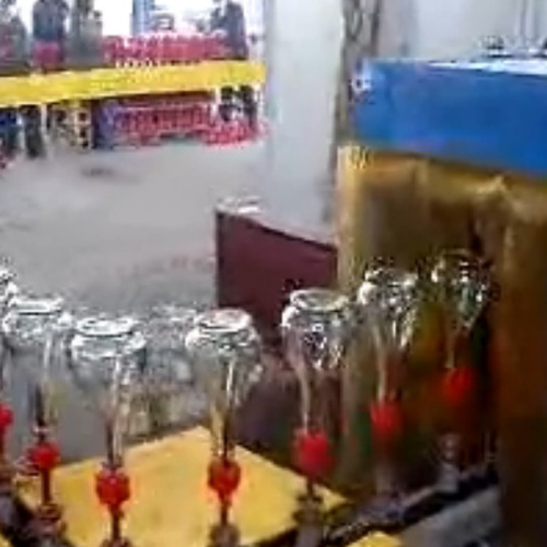 Small glass bottle spray coating machine