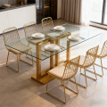Mesa de comedor de vidrio con base de acero inoxidable