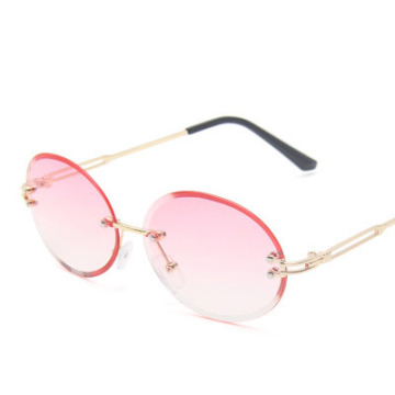 China Factory Vintage Round Rimless Luxury Retro Metal Sunglasses for Women