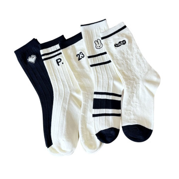 Women's White and Black Stripe Midtube Socks: A Trendy Addition to Your Academic Style