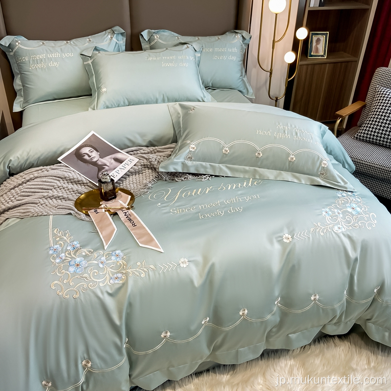 100年代の綿刺繍の寝具はクイーンサイズをセットします