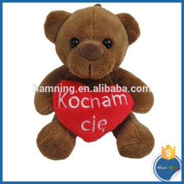 cute valentine plush bear hugging heart gift