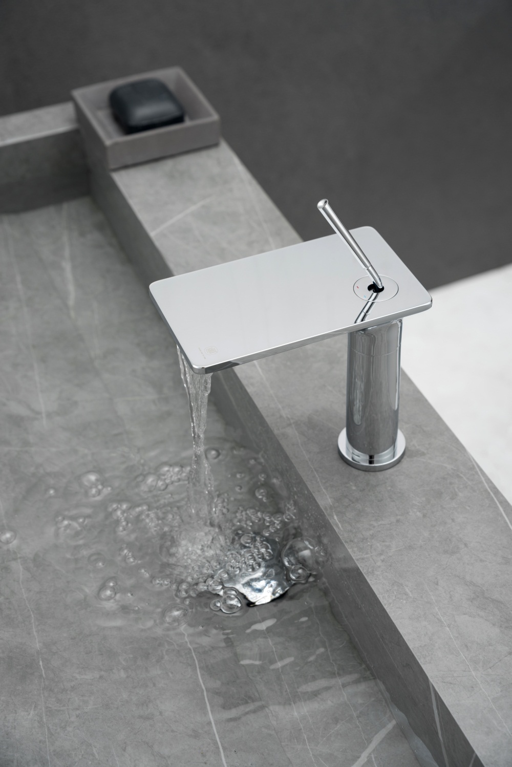 black waterfall sink tap