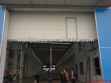 cancello / porta a battente in acciaio a comando automatico / elettrico / elettrico per grande magazzino