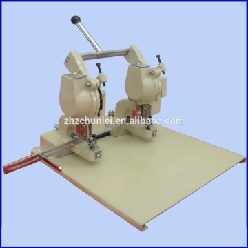 Double head eyelet machine