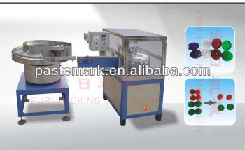 Flip off cap assembly machine