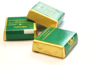 AUTOMATIC CHOCOLATE  FOLDING WRAPPING MACHINE