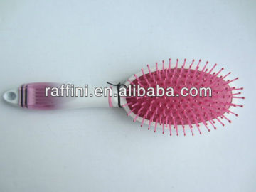 plastic hairbrush with hair pick