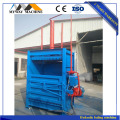 Vertical hydraulic baling machine for waste paper