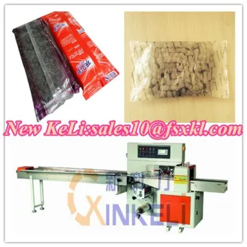 Steel chain flow wrapping machine