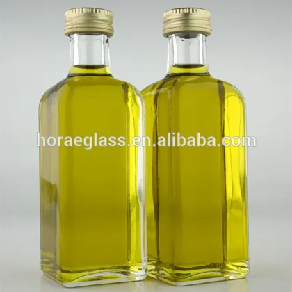 Hot sale clear fancy glass cooking olive oil bottle/wine bottles /High Quality and Distinctive green color wine glass Bottles ol