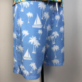 sky blue pineapple-patterned beach shorts