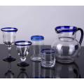 blue color edge drinking glass goblet cup and pitcher