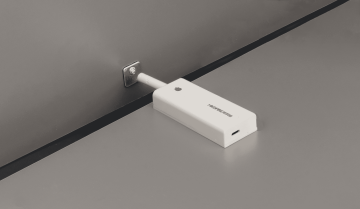 Electric re-bounder for handle-free cabinet doors