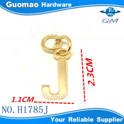 small light gold metal letter J ornament