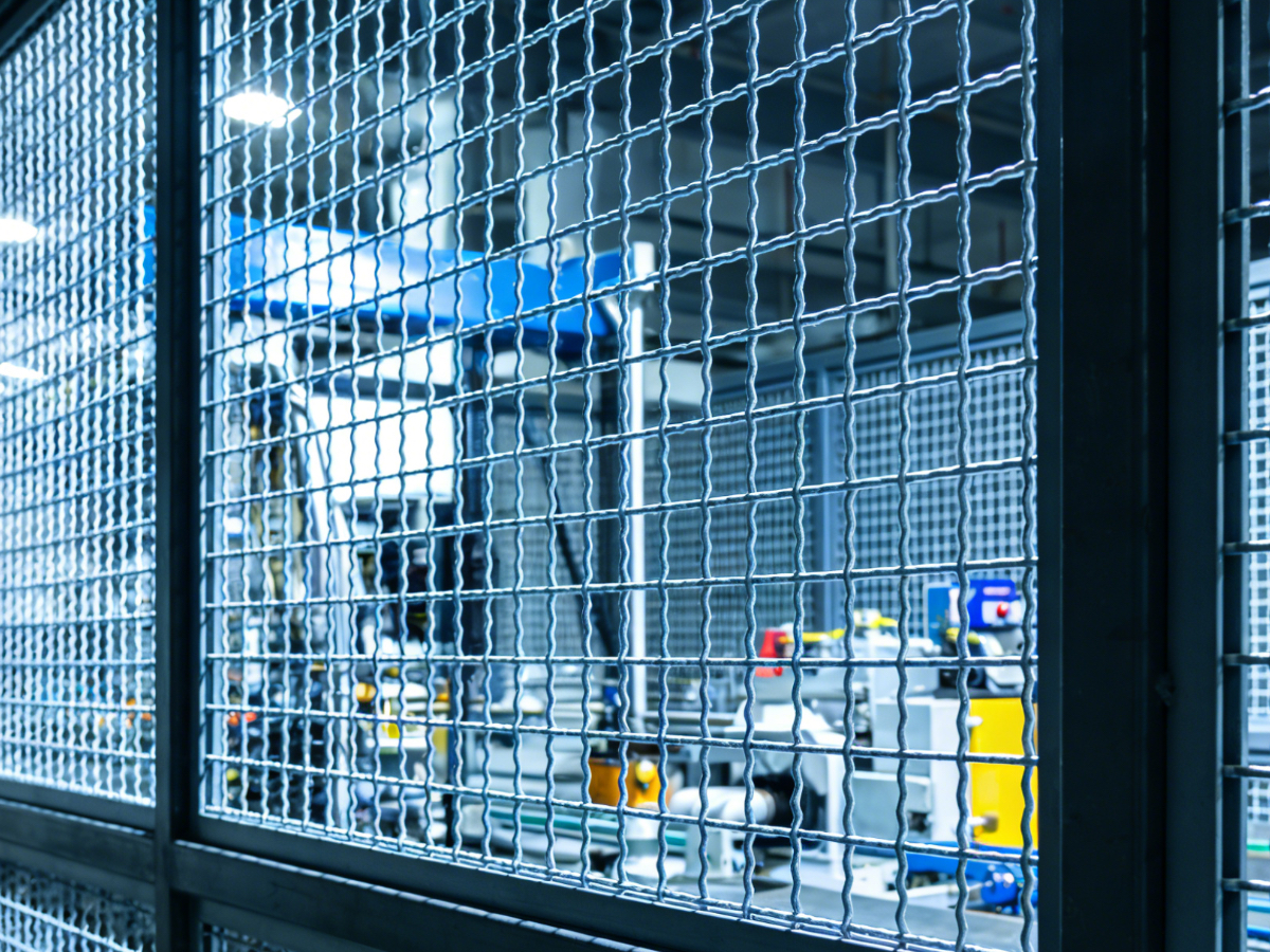 Woven square wire mesh installed in industrial or agricultural application