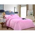 Conjunto de cama rosa lavado
