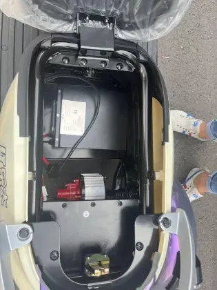 One three-wheeled electric vehicle