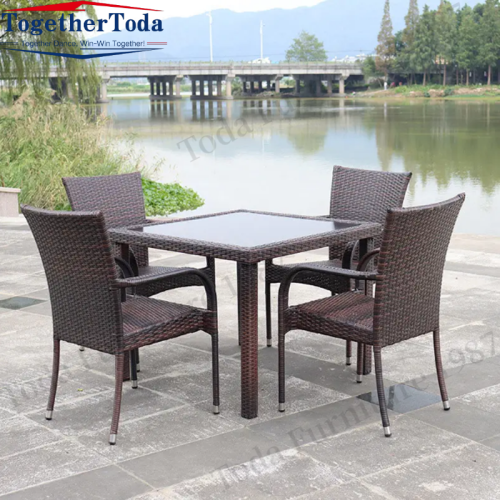 Outdoor rattan garden dining chair with table