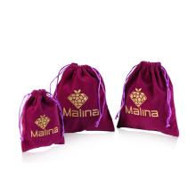 Drawstring Purple velvet bag with gold logo