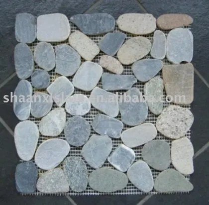 Green pebble stepping stone on mesh