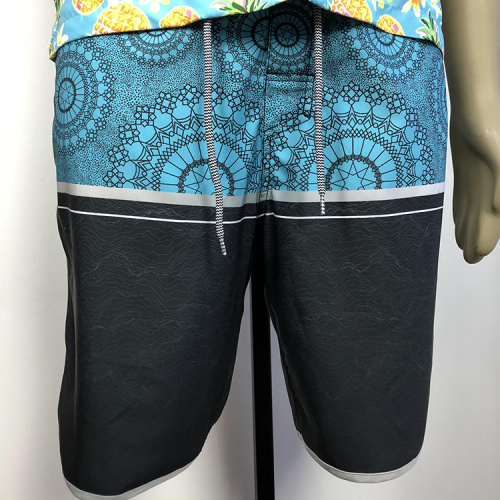 Blue and black patterned boardshorts