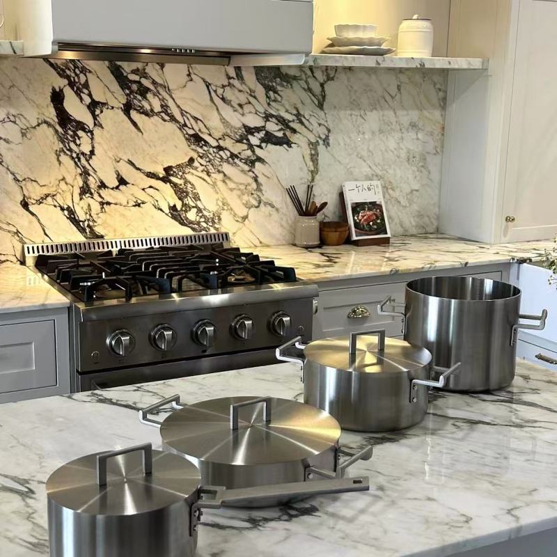 Professional Stainless Steel Cookware on Gas Stove