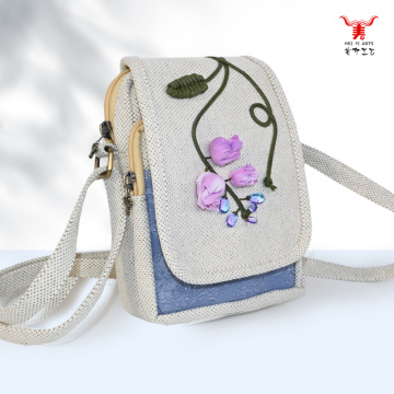 Bolsa crossbody com aba tecida com cordão de cera de jacarandá