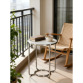 Mesa de café de cerámica redonda con patas de acero inoxidable