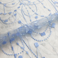 Tissu de broderie de dentelle bleue et blanche