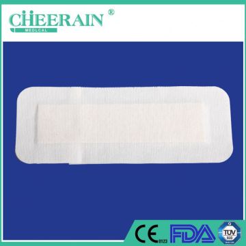 Non-woven self adhesive wound dressings