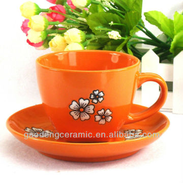new orange coffee cup & saucer