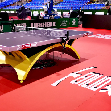 WTT competition using red color table tennis flooring