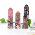 Натуральный родонит obelisk декоративный кристалл