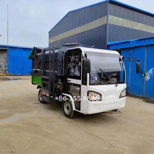 Camion de déchets montés sur latéraux à quatre roues électriques