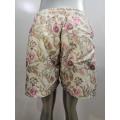 Pantalones cortos de playa para hombres con estampado floral blanco cremoso