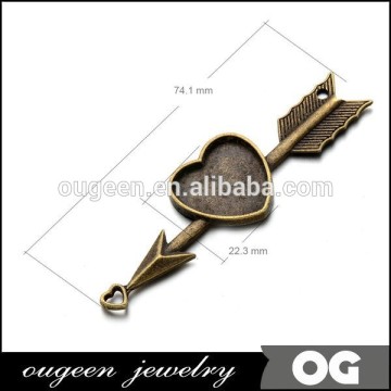 Zinc Alloy filled,antique bronze plated,length:74mm Width:22.3mm Key zinc alloy nickel free pendant with 18mm heart bezel