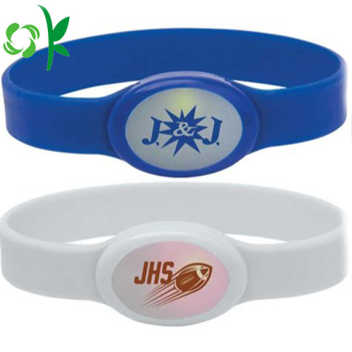 Bandas de bracelete de poder de logotipo em relevo com etiqueta de energia