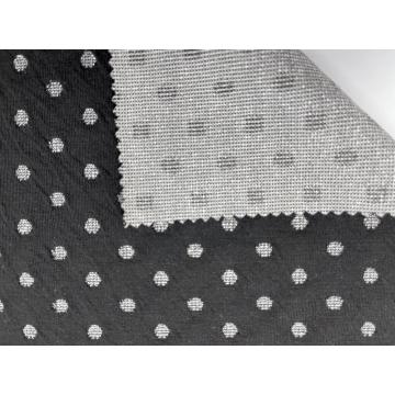 85% poliéster 13% lurex 2% elastano tecido jacquard