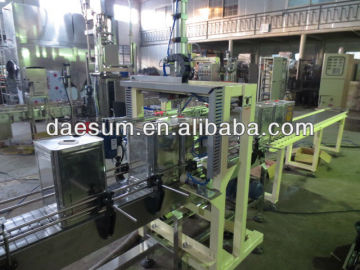Automatic screwing lids machine for cans