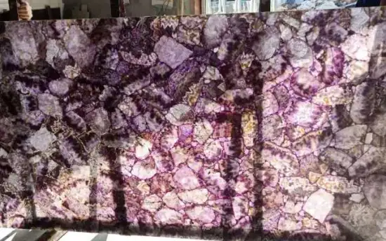 Translucent  amethyst  stone background slab