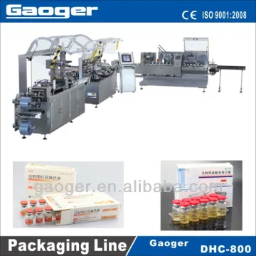 Vertical vials blister packing and cartoning line