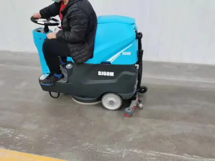Small industrial floor washer for concrete floors