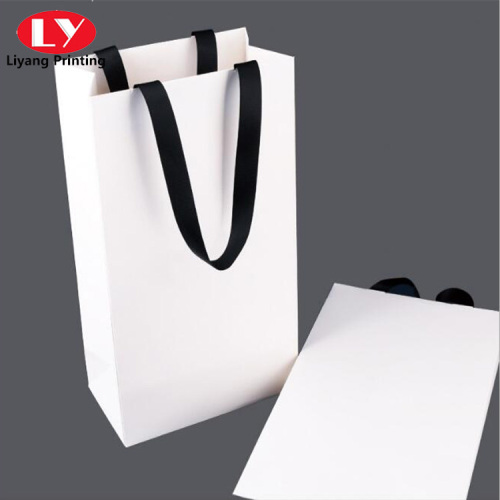 Sac en papier shopping blanc personnalisé avec poignée