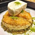 Traditional fresh delicious Turkish Carrot Slice baklava with pistachio. Dessert Baklava Famous Brand Turkish Baklava pistachio