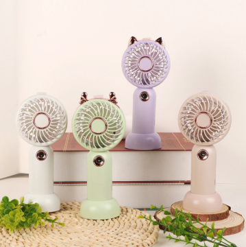 Cartoon-style spray-powered handheld rechargeable fan