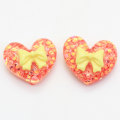 100 sztuk w kształcie serca Bowknot żywica Cabochon płaskie koraliki z tyłu szlam dziewczyny akcesoria do włosów DIY zabawka dekoracyjna Charms