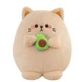 Fat chaton mangeant des oreillers en peluche avocat