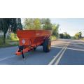 Frozen and dried manure spreader