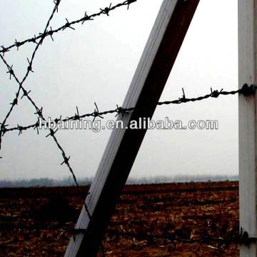 barbed wire picket fence